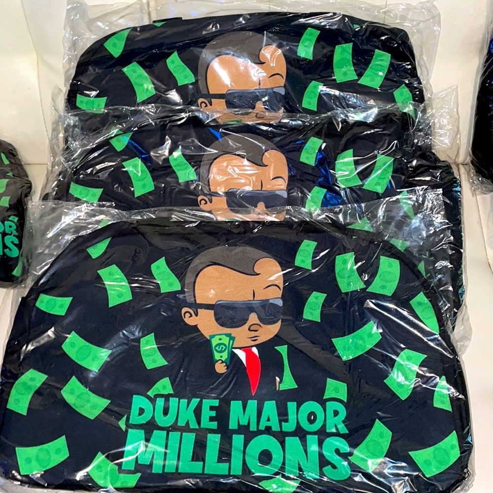 Duke major millions men travel bags